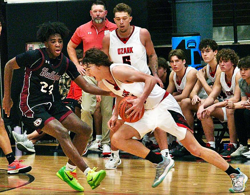 OZARK'S HUDSON ROBERTS makes a move to the bucket.