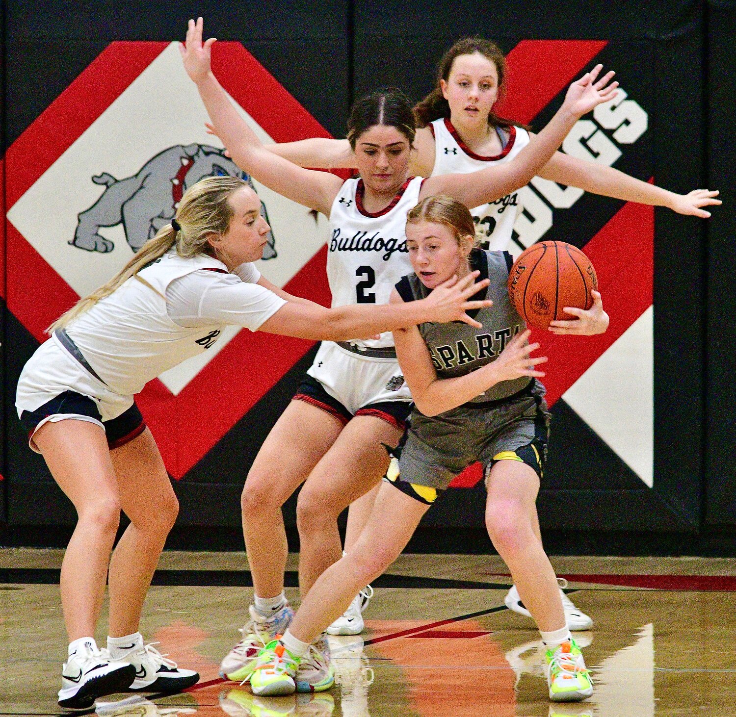 SPARTA'S MYA FULTON finds herself surrounded by Blue EYe defenders.