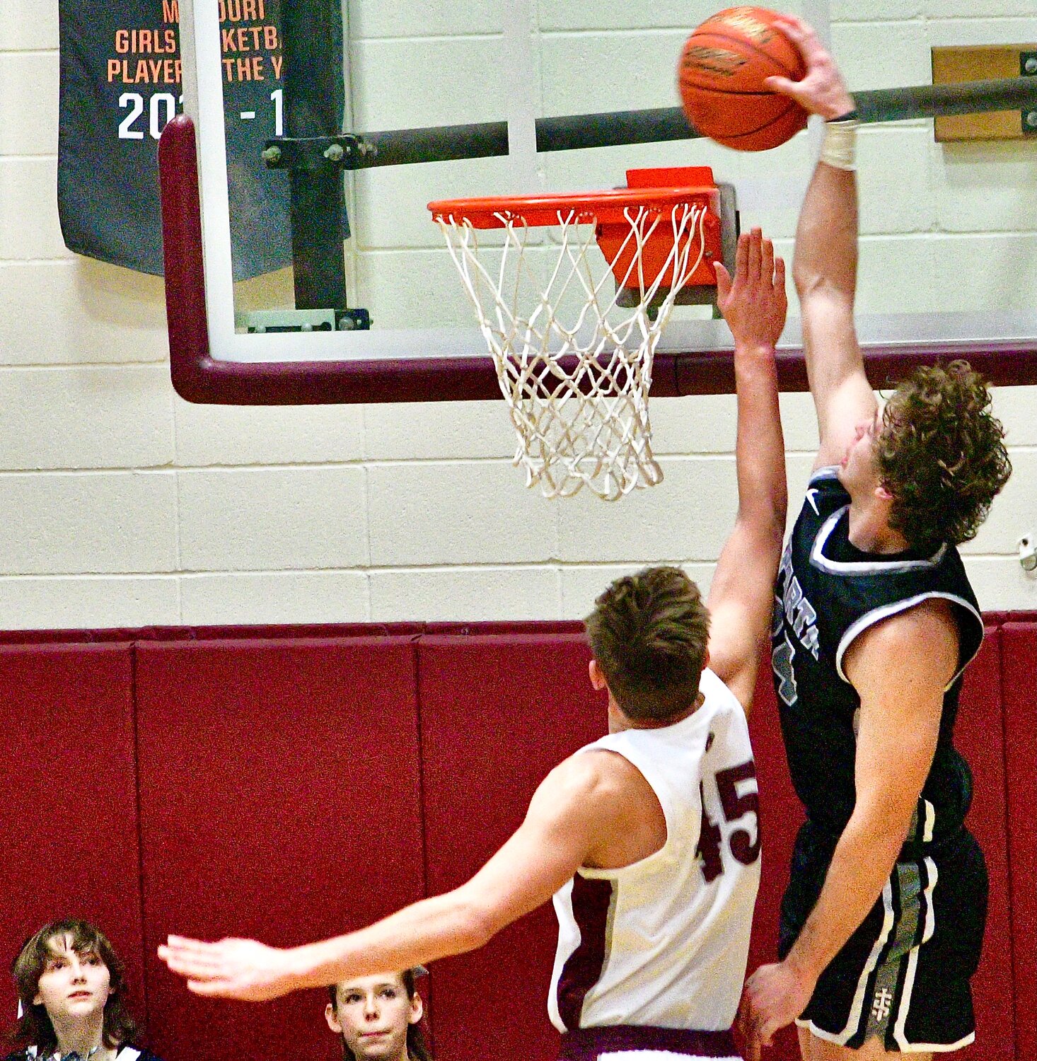 SPARTA'S JAKE LAFFERTY soars above a Strafford defender on his way to a dunk Saturday.