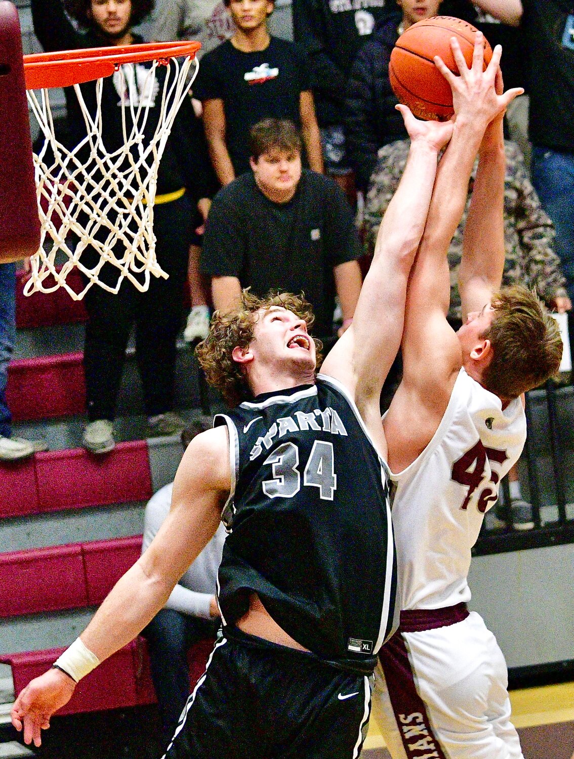 SPARTA'S JAKE LAFFERTY reaches for a rebound.