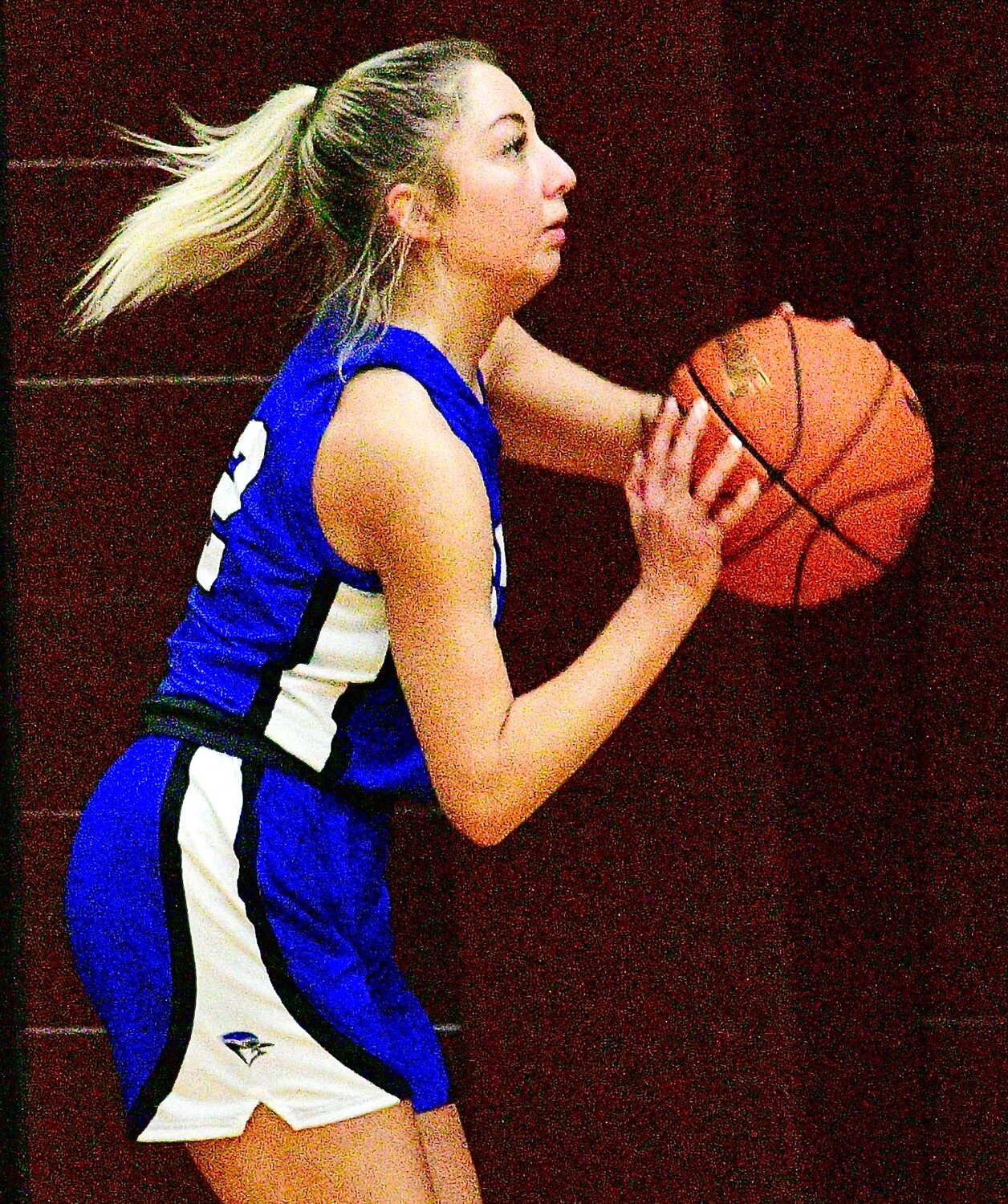 CLEVER'S KAILYN ZIEGLER takes aim at the bucket.