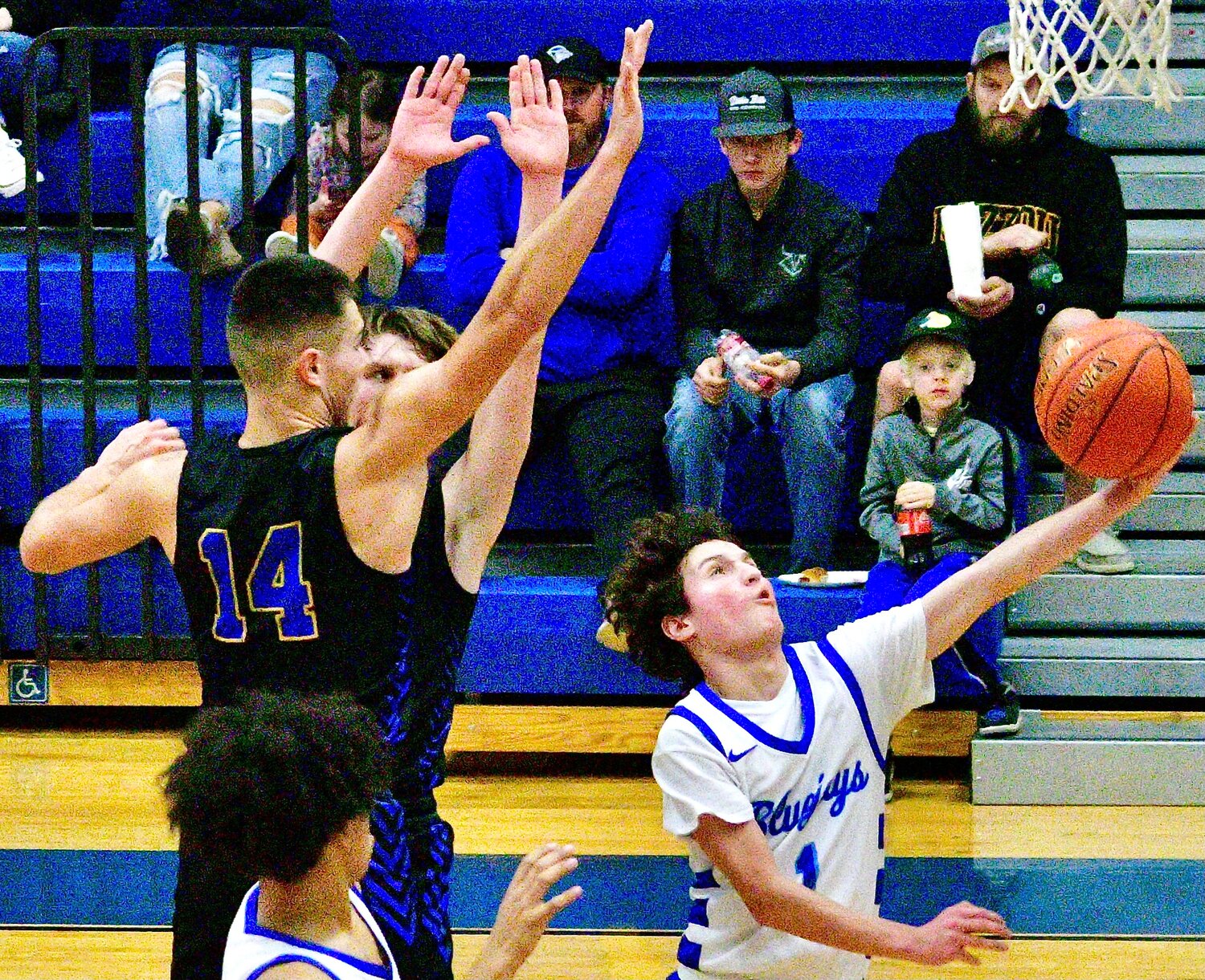 CLEVER'S BRAYDEN VERCH drives for a layup.