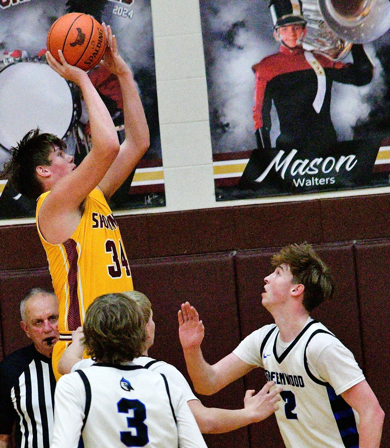 SPOKANE'S ETHAN NEWELL shoots for two of his 12 points.