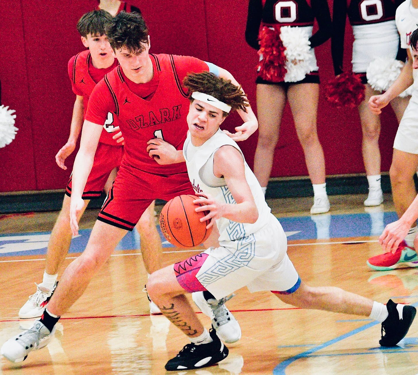 OZARK'S JACE WHATLEY stays in front of a ball-handler.