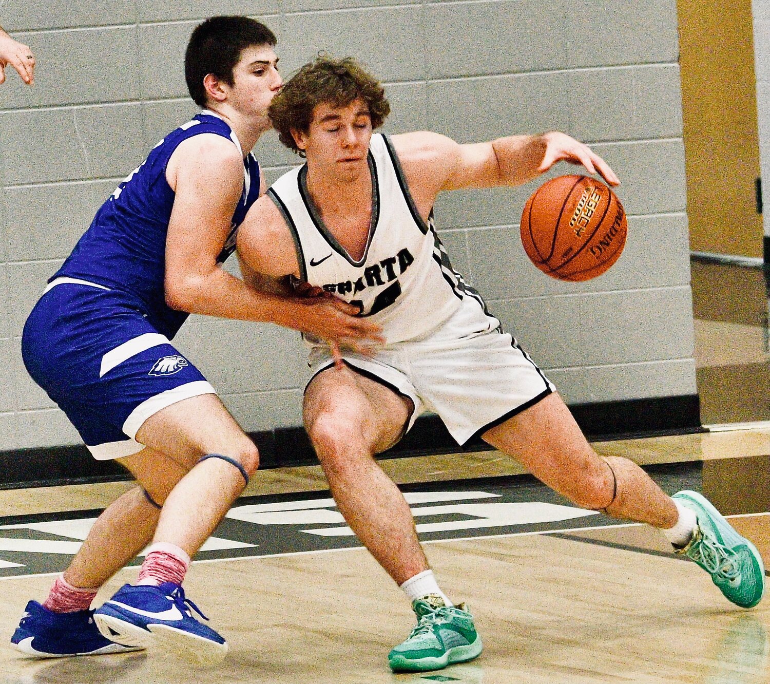 SPARTA'S JAKE LAFFERTY looks for room around a defender.