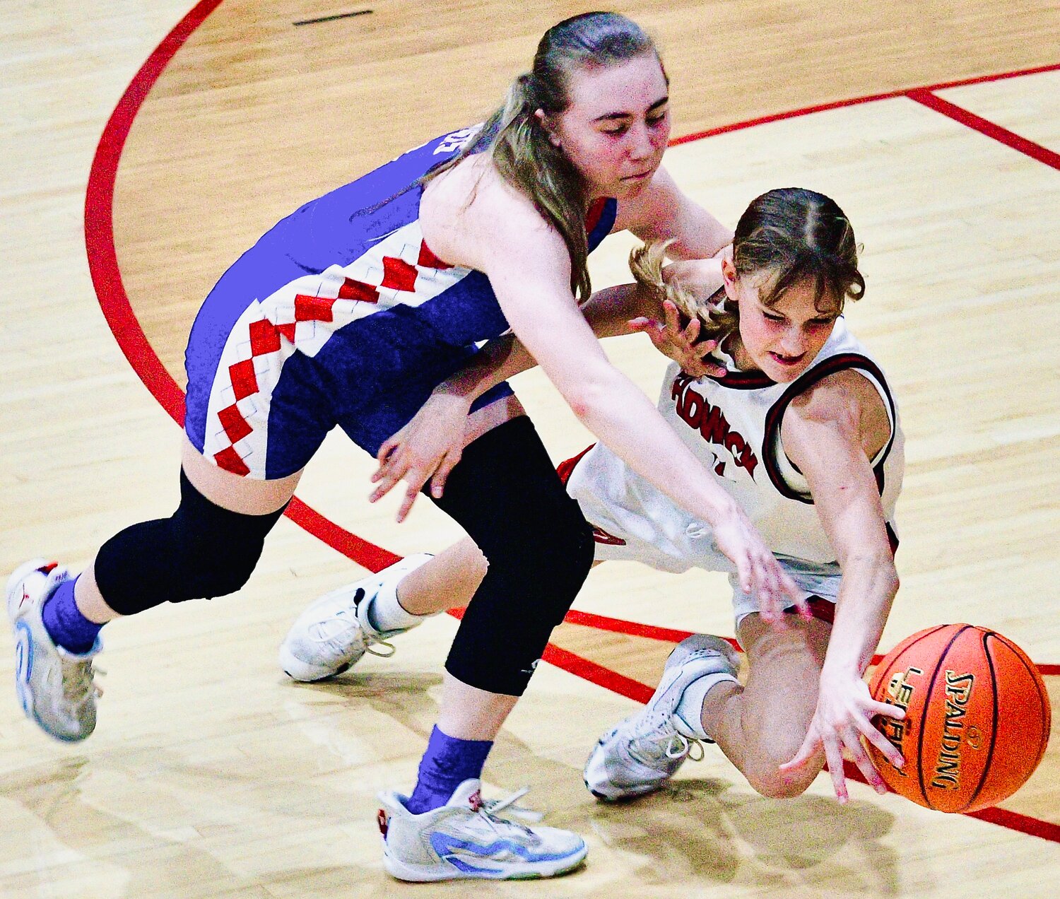 CHADWICK'S EMILY LANDRY hits the floor for a loose ball.