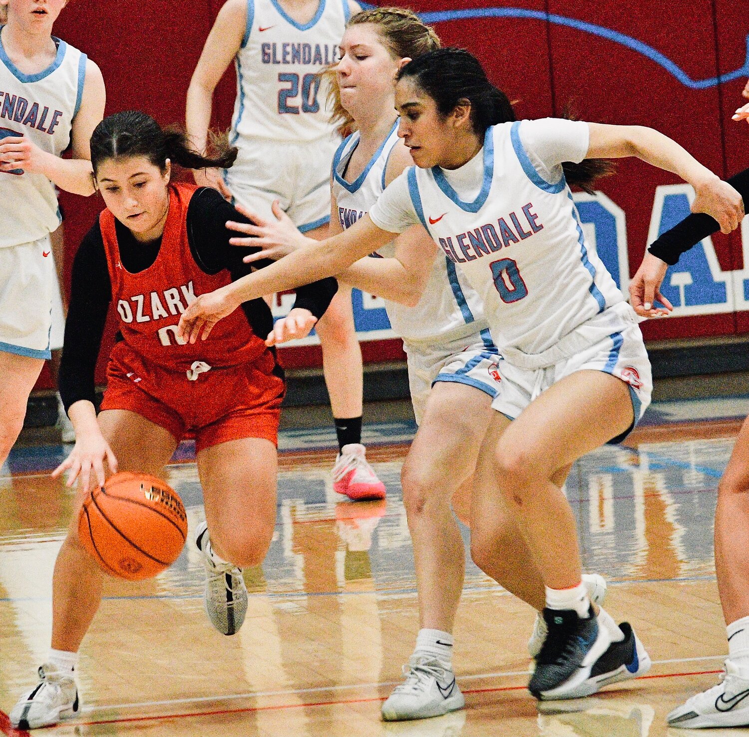 OZARK'S KORI ROUSSELL protects the ball.