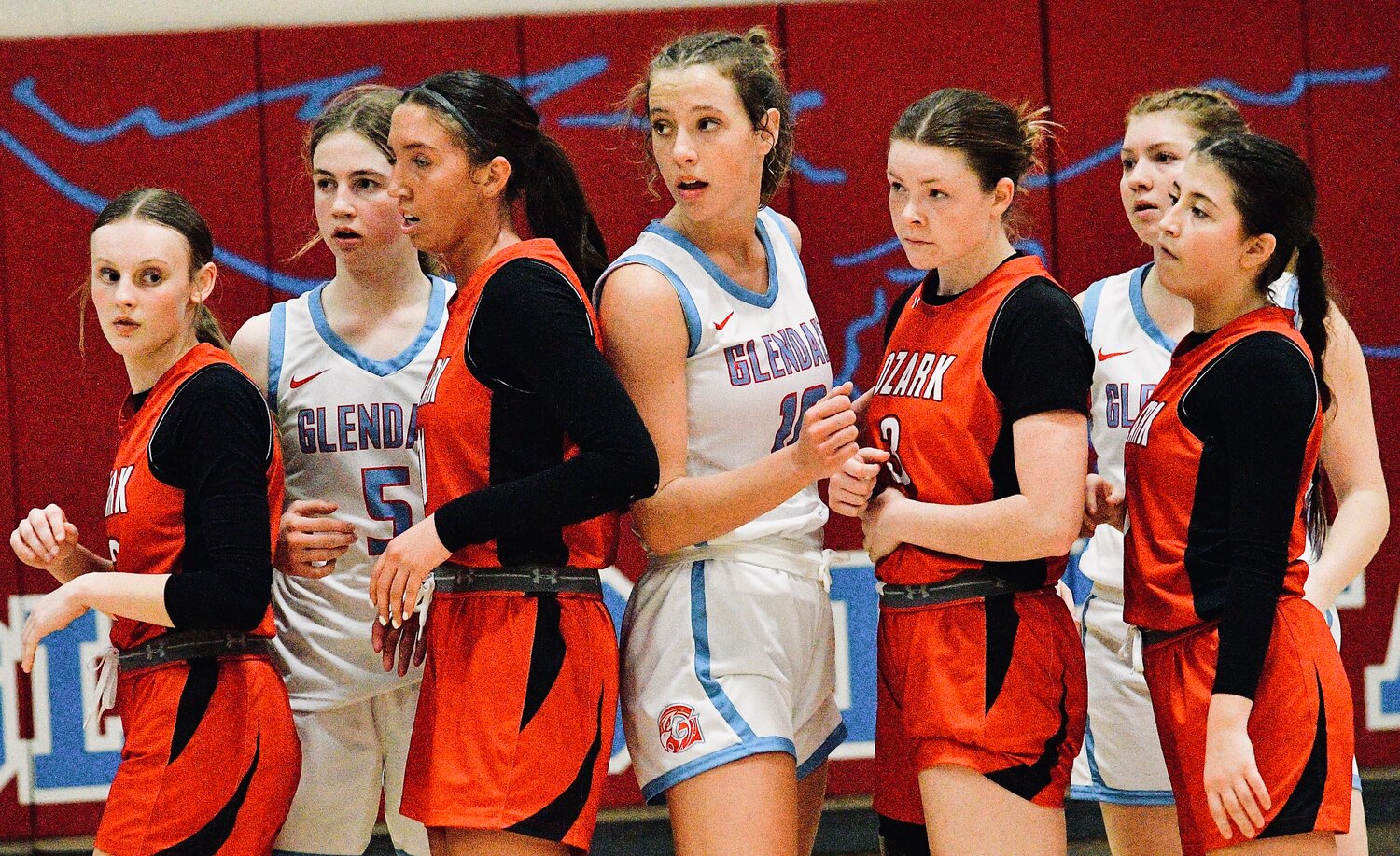 OZARK AND GLENDALE PLAYERS line up while preparing for an in-bounds pass.