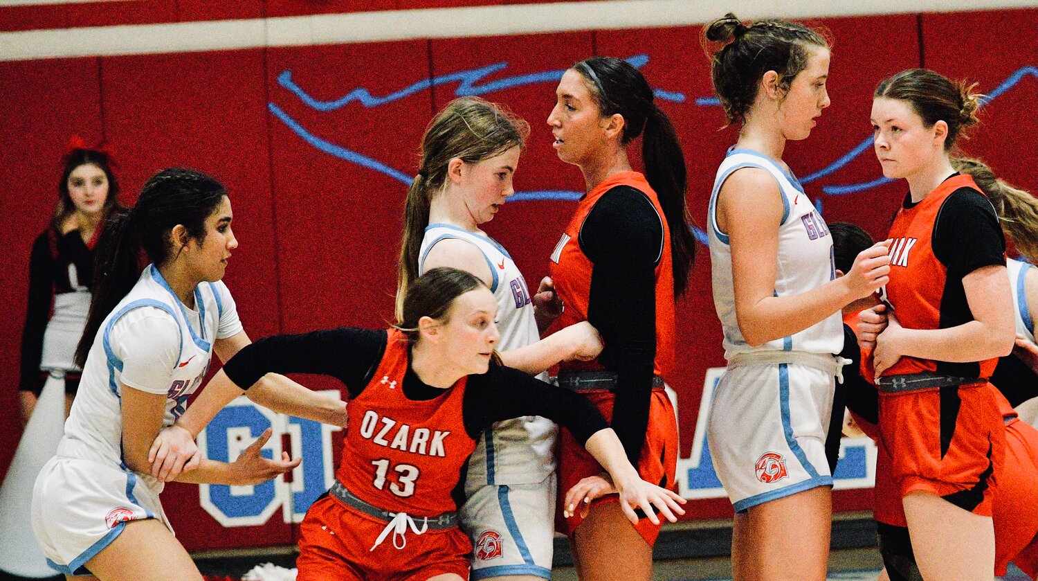 OZARK'S LYLA WOOD breaks from a pack of players.