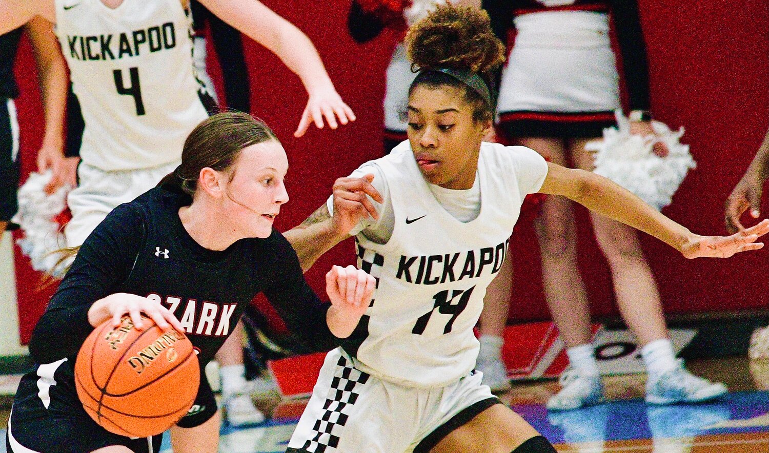 OZARK'S LYLA WOOD looks for a lane to the hoop.