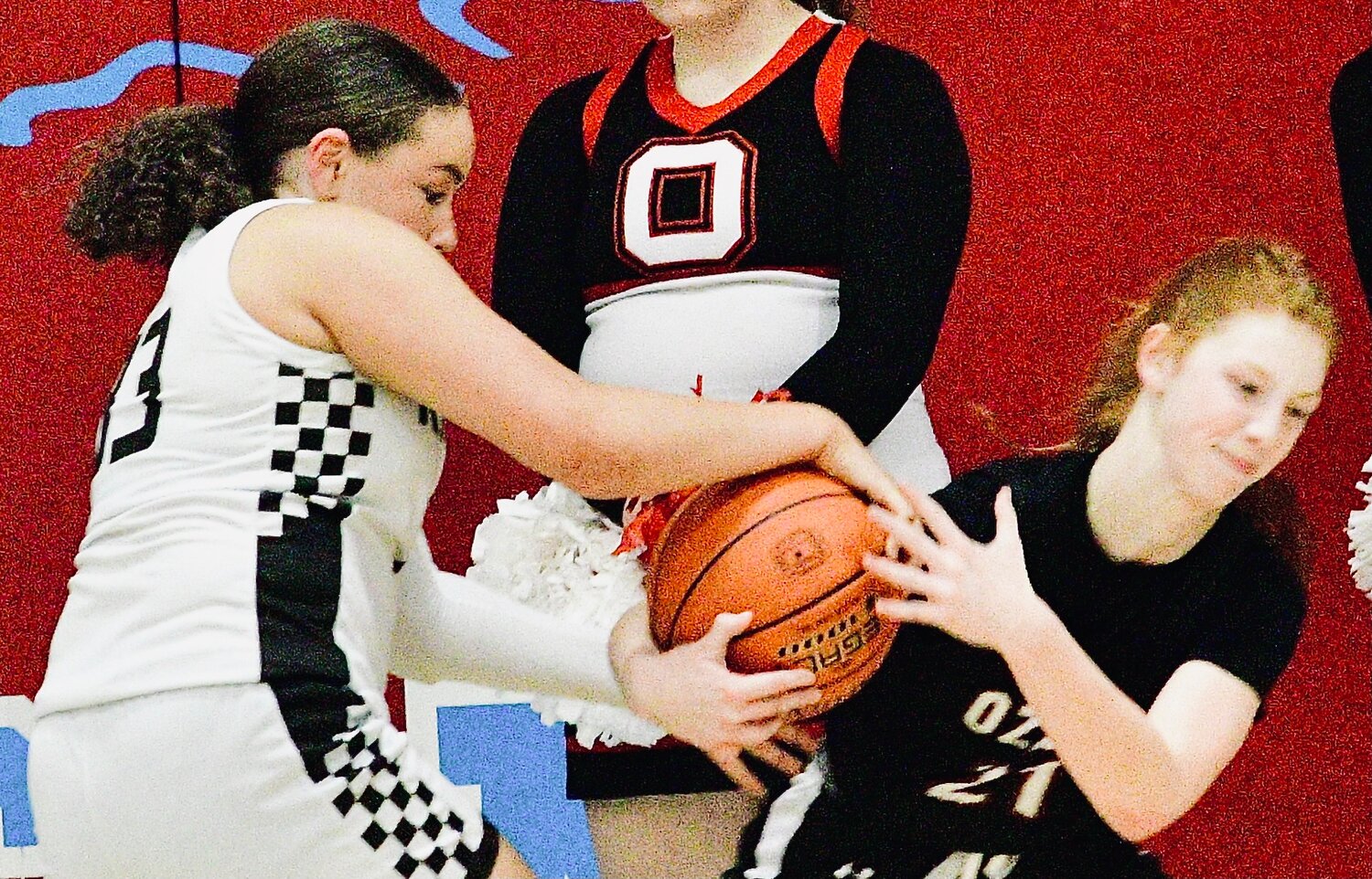 OZARK'S BRIA WRIGHT battles for control of the ball.