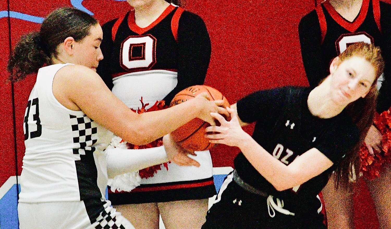 OZARK'S BRIA WRIGHT fights for possession of the ball.