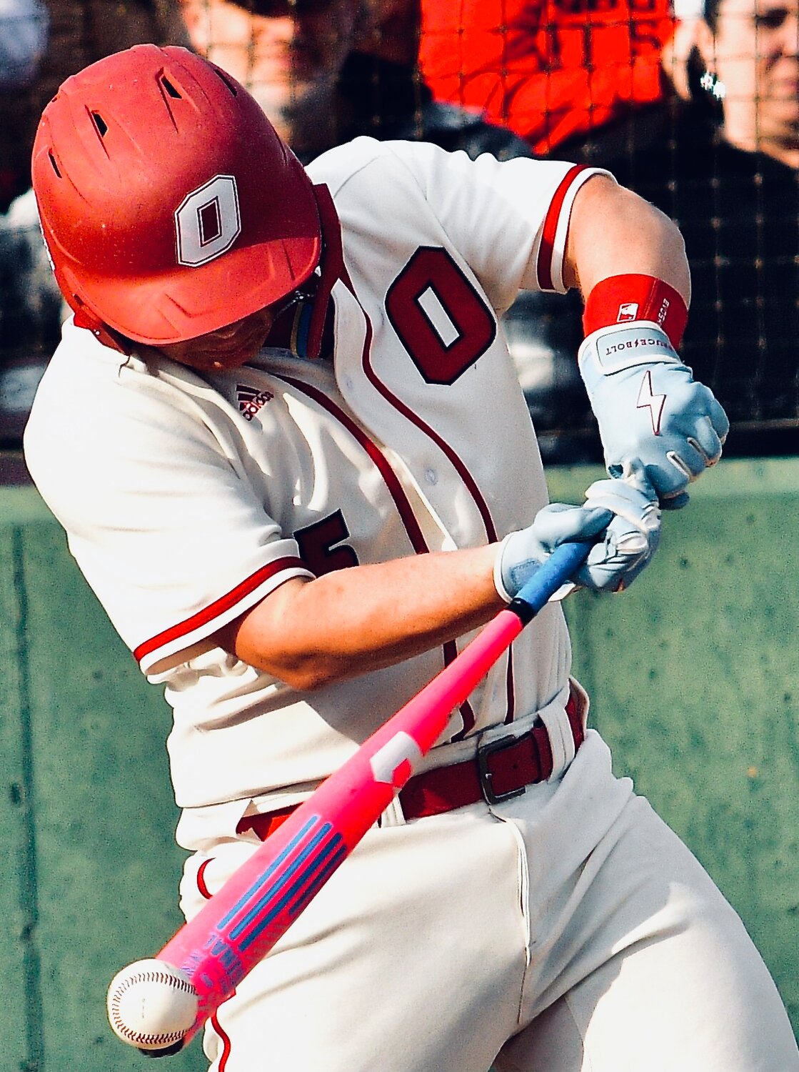OZARK'S GAVIN MILLER connects off the end of his bat.