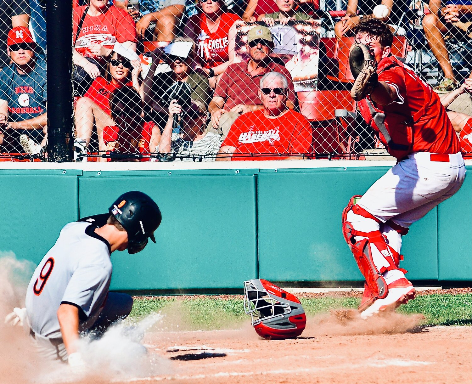 NIXA'S JACK EDWARDS reaches for a late throw at home plate versus Republic Tuesday.