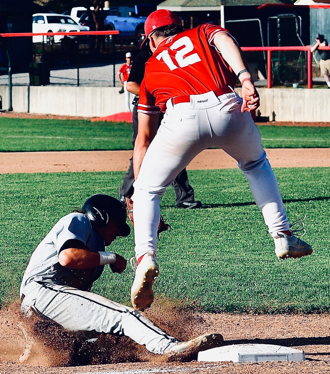 NIXA'S BRODEN MABE applies a late tag at third base.