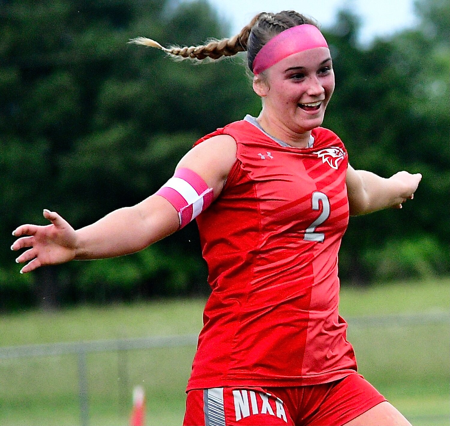 NIXA'S SAM MCCLAIN is all smiles after a Lady Eagles goal.