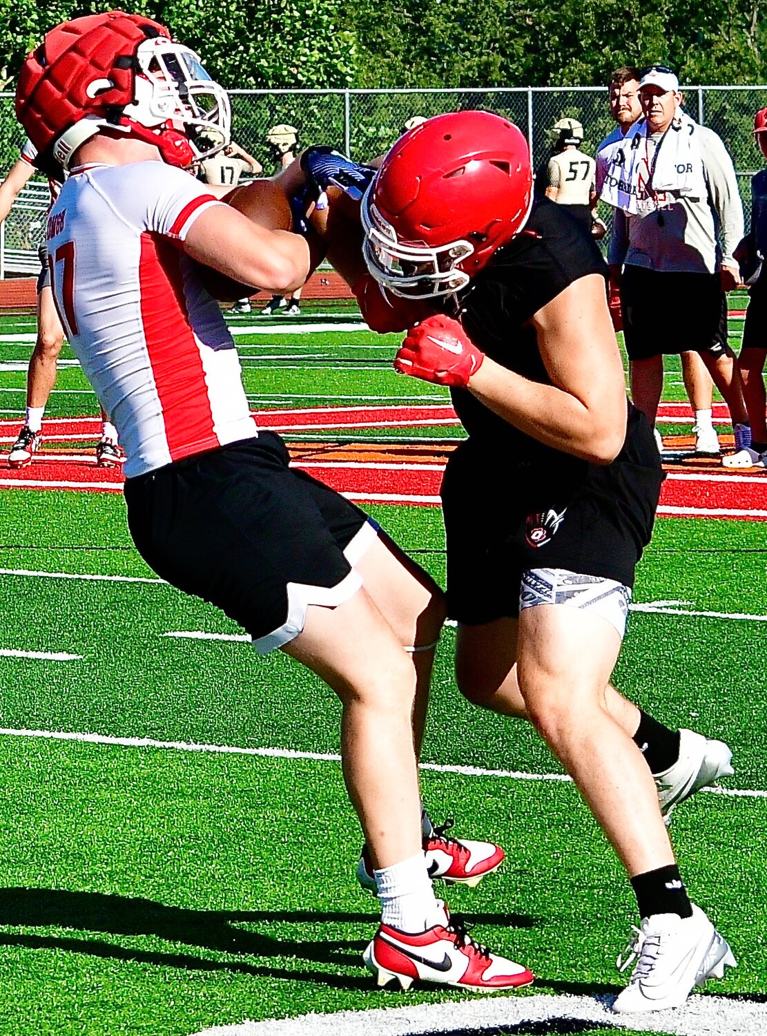 NIXA'S LANE MELTABARGER makes a catch while defended by an Ozark player.