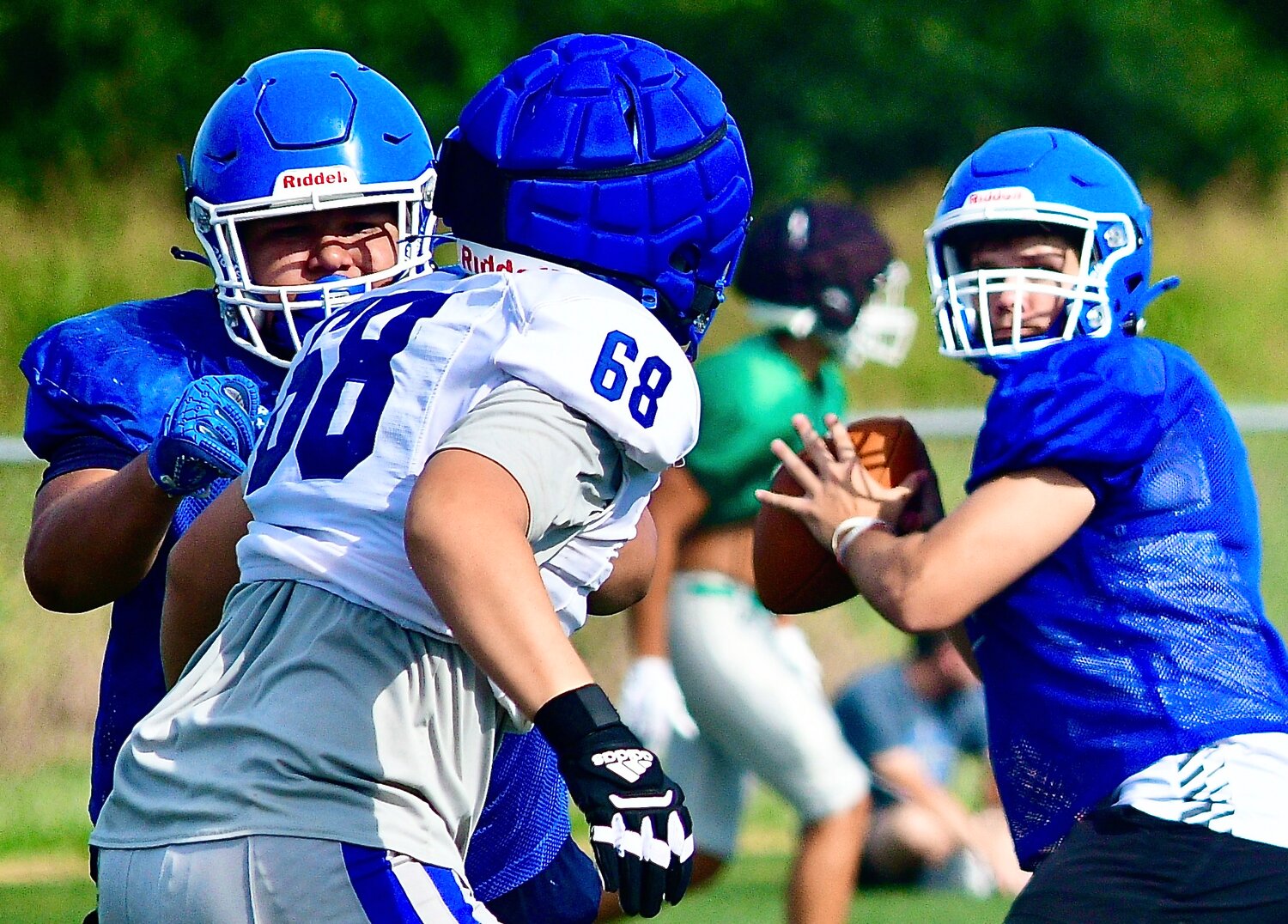 CLEVER'S ISAIAH HUTSON provides protection for quarterback Rex Deters.