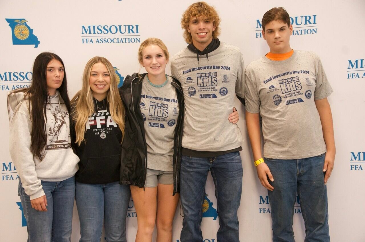 Nixa, Spokane FFA Chapters help pack meals for families in need at