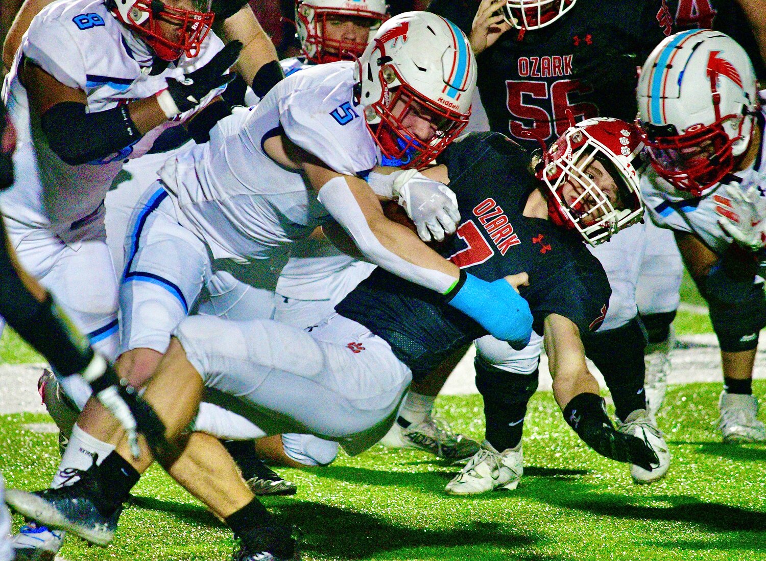 OZARK'S RORY BANKS maintain a tight grip on the pigskin.