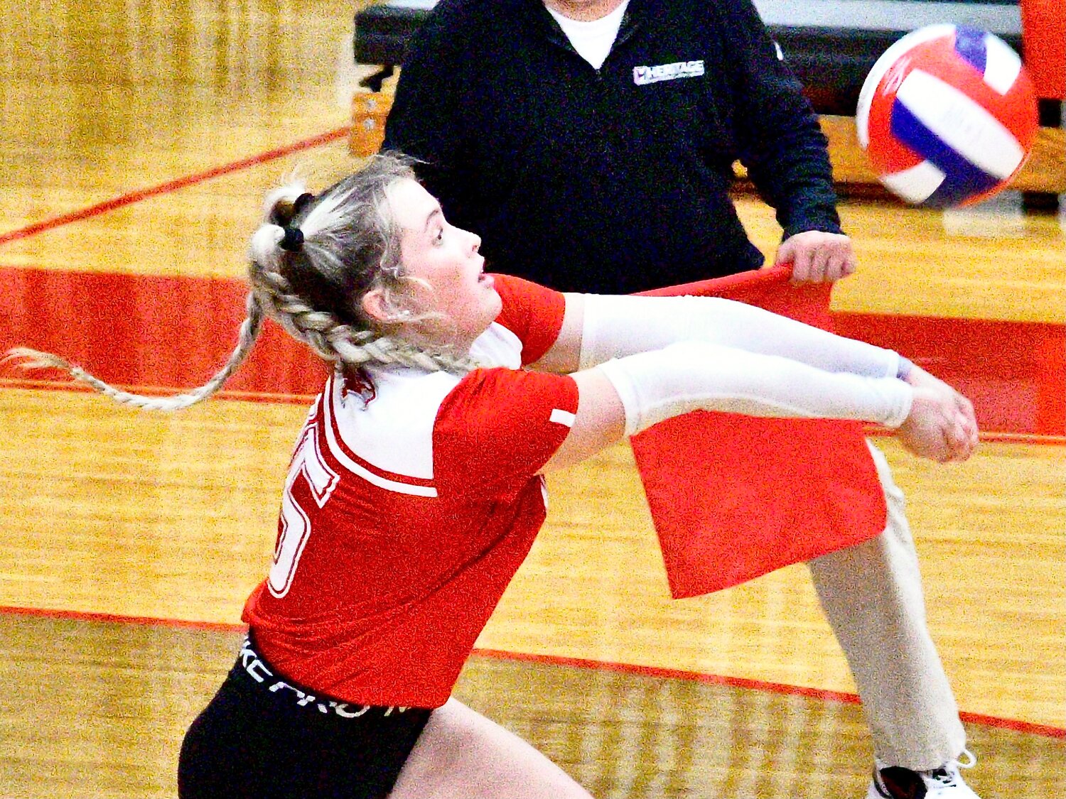 NIXA'S AMELIA WHITE makes a pass.