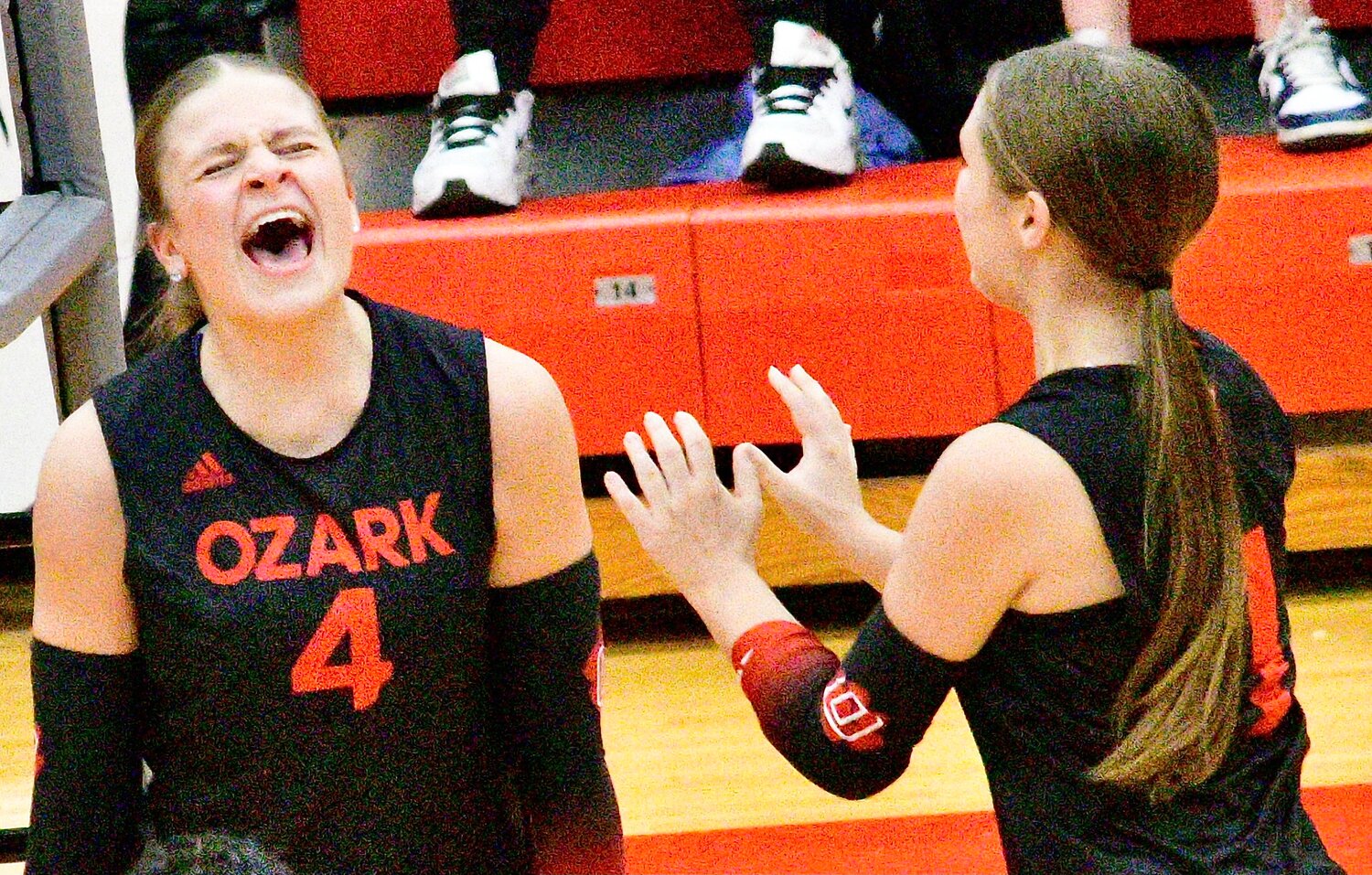 OZARK'S BRINLEY WATSON AND BROOKLYN SOLOMON rejoice after a Lady Tigers point.