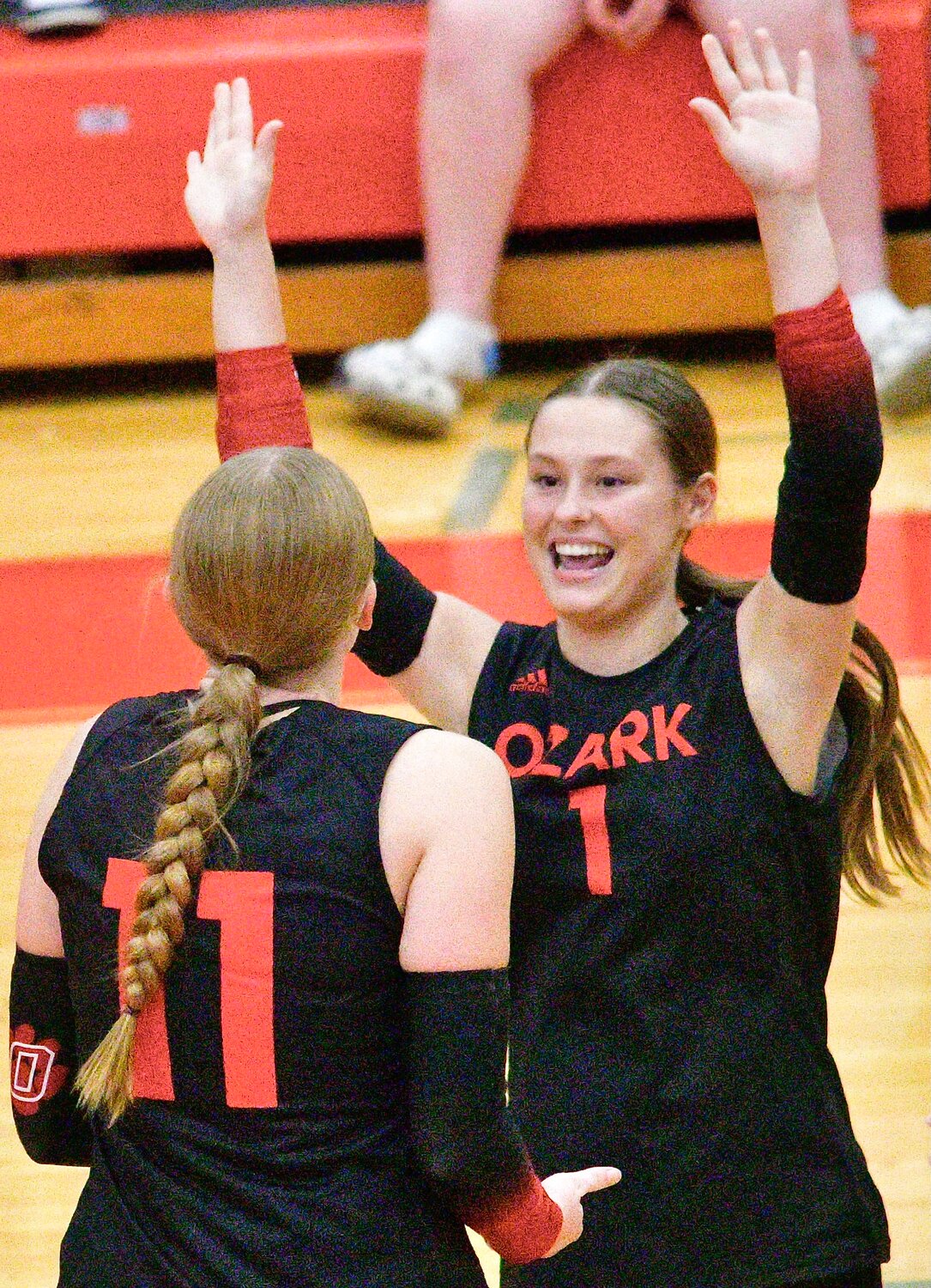 OZARK'S TARA VENABLE AND BROOKLYN SOLOMON celebrate a Lady Tigers point.