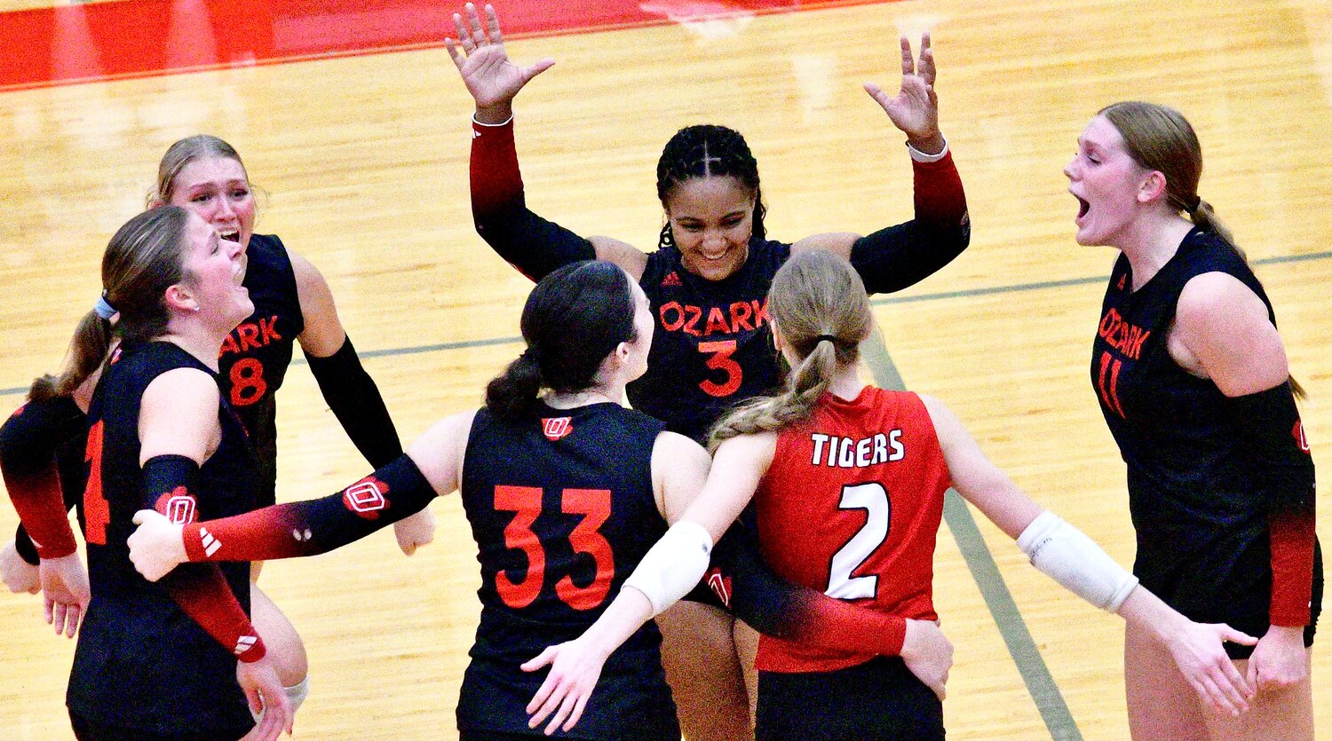 OZARK PLAYERS begin their celebration.