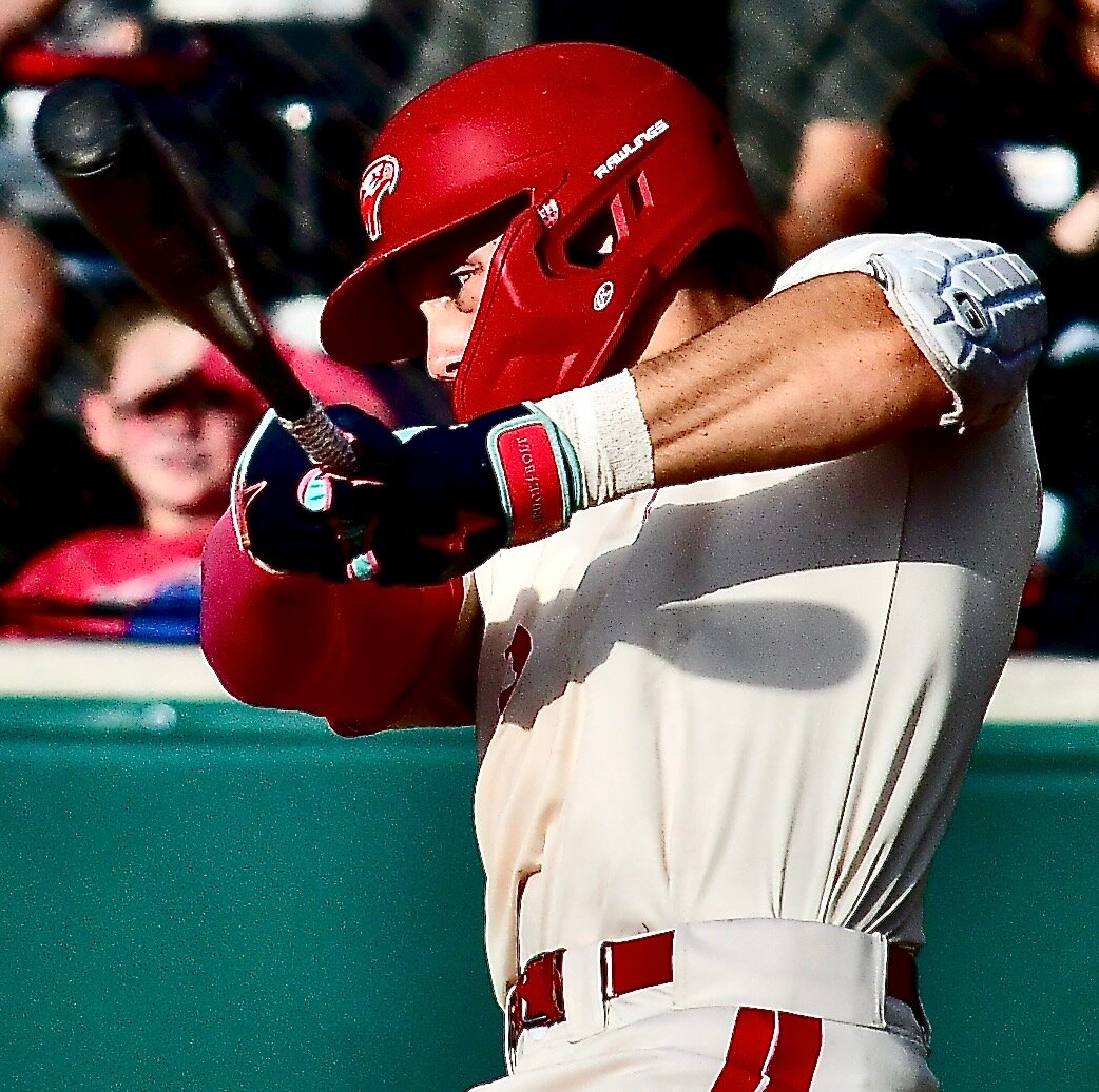 NIXA'S CAEDEN CLOUD follows through on a swing against Ozark on Thursday.