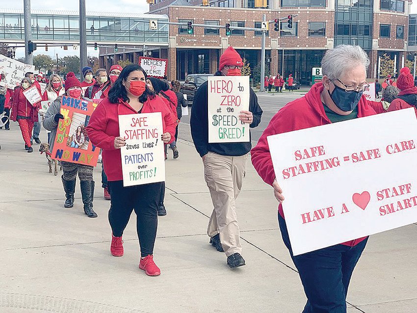 Nurses gather for an “informational picket” outside of Sparrow Hospital in Lansing.