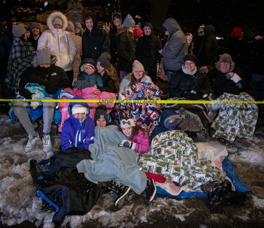 Festivalgoers await the start of the 25th Annual Electric Light Parade.