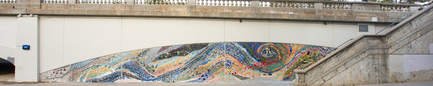 Despite the unpredictable and idiosyncratic contributions of more than 1,000 people, Alexandra Leonard is surprised at how closely the finished, 650-square-foot mosaic follows her original design, a ceramic snapshot of the dynamic forces that swirl earth, air and water together with the human-built environment.