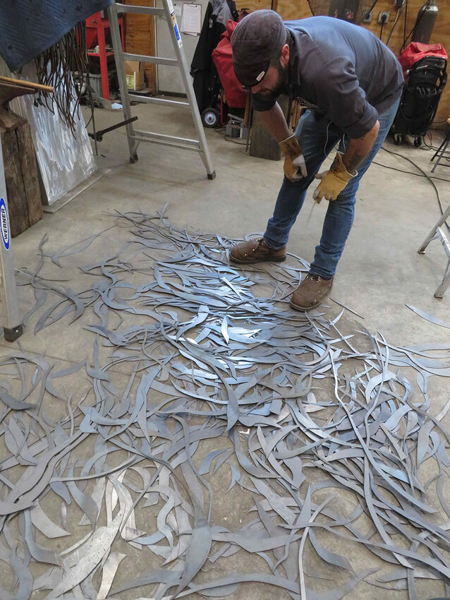 Although Iler made a reference sketch for “Mother Tree,” he prefers “sketching in metal,” shaping the work as he builds.  