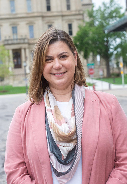 Slotkin on Townsend Street in front of the south side of the Capitol. As questions in a recent interview turned to politics, the interview was moved at her request from her government space in the Federal Building to the street.