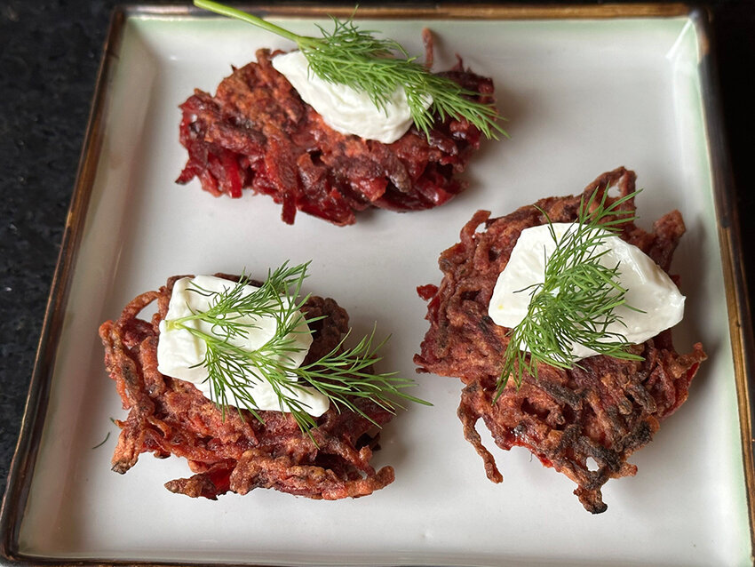Beet latkes, a take on traditional potato latkes, melt into a sweet, savory mouthful that will leave you wanting more.