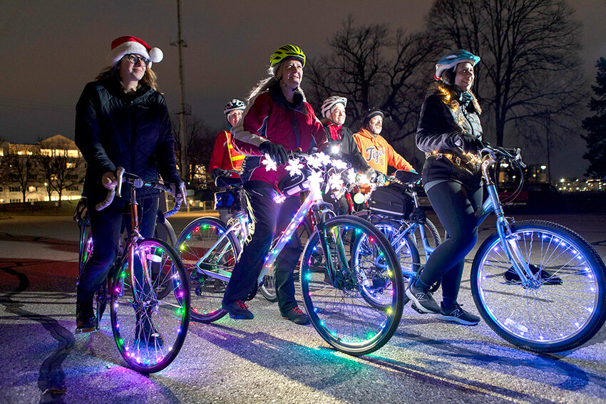 Raymond Holt for City Pulse
Not all holiday lights are stationary. Lansing Bike Party members take advantage of an unseasonably warm December evening for a ride and holiday celebration.