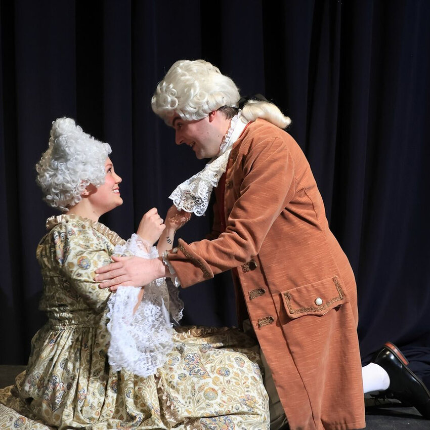 Taylor Haslett as Constanze Weber and Lewis Elson as Wolfgang Amadeus Mozart in Riverwalk Theatre’s production of “Amadeus.”