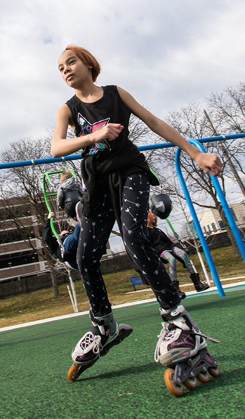 Cecelia Scholten, 10, of Lansing, practices skating.
