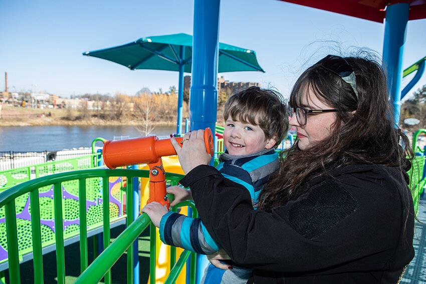 Amber Yarger of Lansing, and her son Rowan, 3, scoping out the playground.