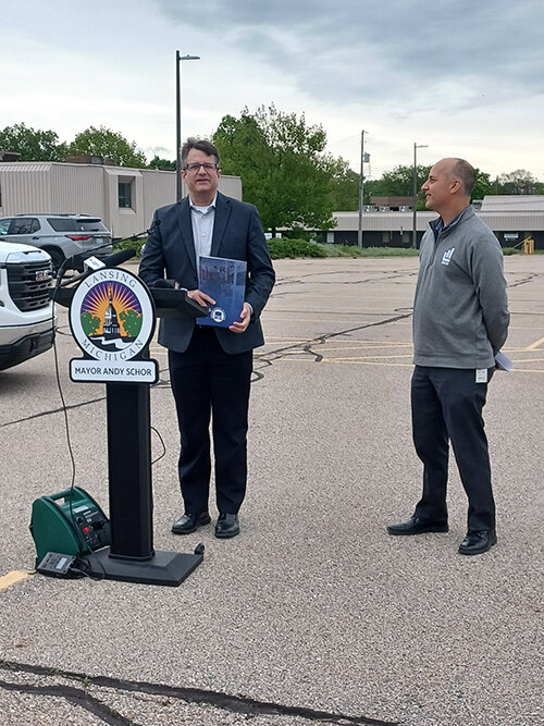Brad Funkhouser (left), CEO of the Capital Area Transportation Authority, at the press conference. CATA could benefit by sharing space for a new headquarters at the new city hall across the street from CATA’s downtown transit hub.