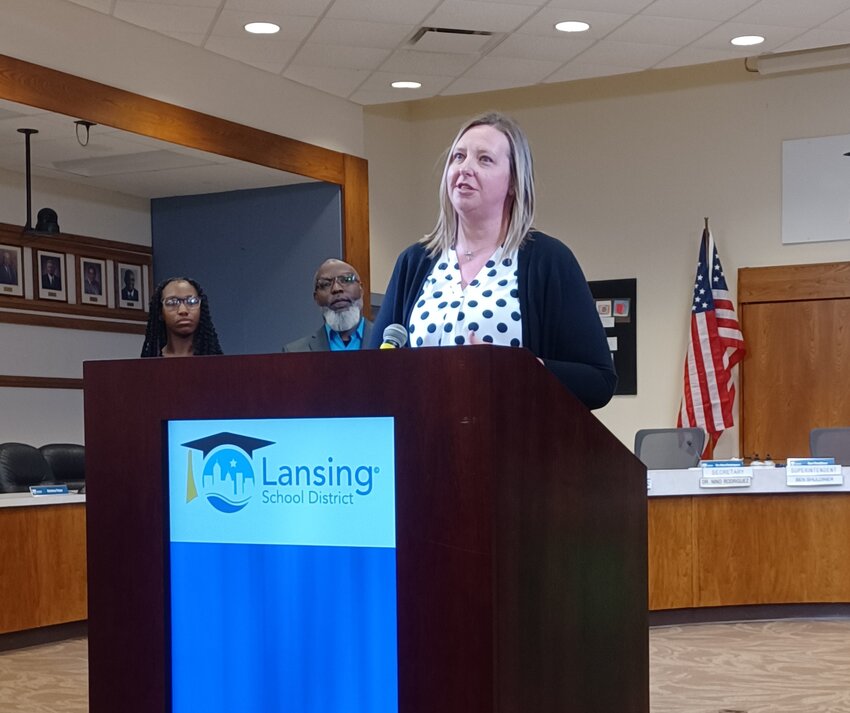 Kristina Tokar, chief operating officer for the Lansing School District, discusses recent green initiatives like the installation of new energy efficient LED lighting at Sexton High School, Lyons Elementary and Everett High School during a May 15 press conference.