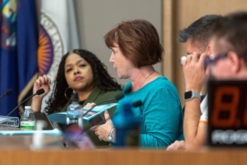 Lansing Charter Commissioner Jody Washington (second from left) expresses her doubts that the city needs a deputy mayor position, a role that is not established through the city's charter.