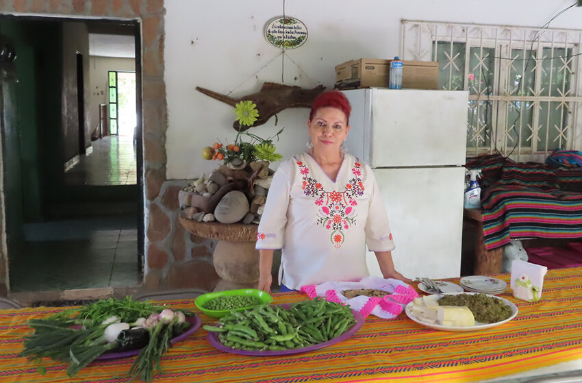 Lilia Peralta prepares to make fresh beans with peas at her home in La Purísima, Mexico. 