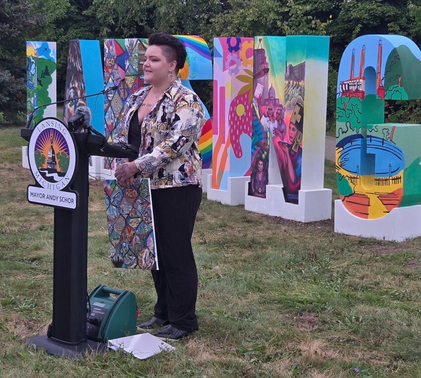 Jasmyne Wells went through dozens of possible iconic Lansing images to choose from to include in the first “N” of the Lansing sign.