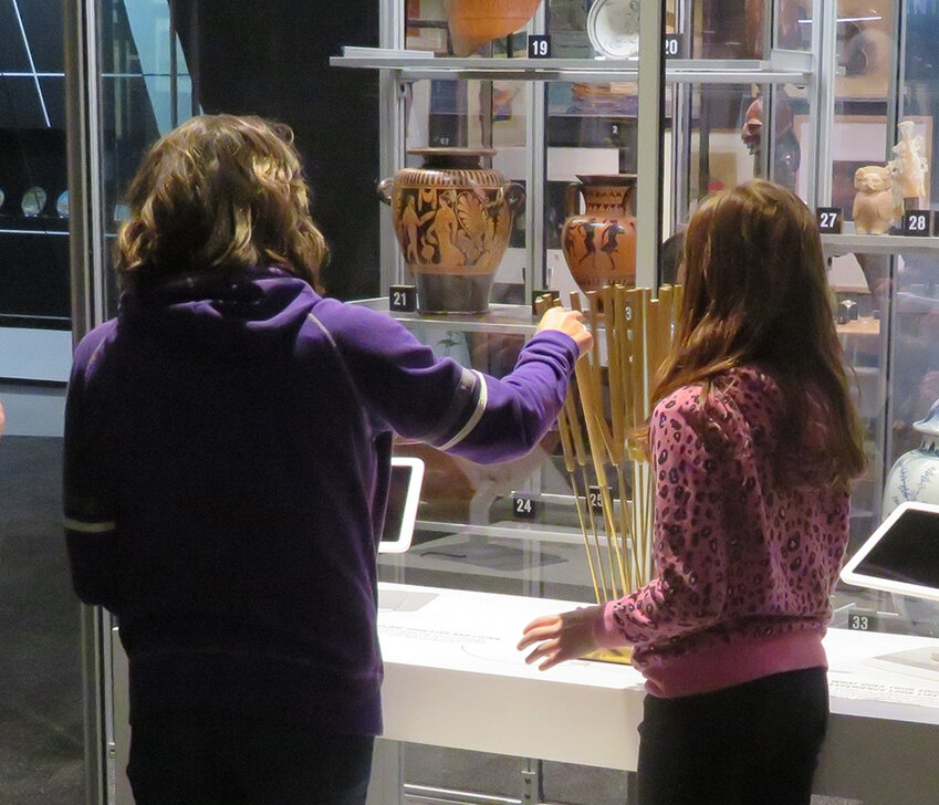 Lawrence Cosentino/City Pulse
Potterville students on a field trip ring a replica of Harry Bertoia’s beryllium chimes  at a sensory station in the museum’s lower-level CORE gallery on a March visit.