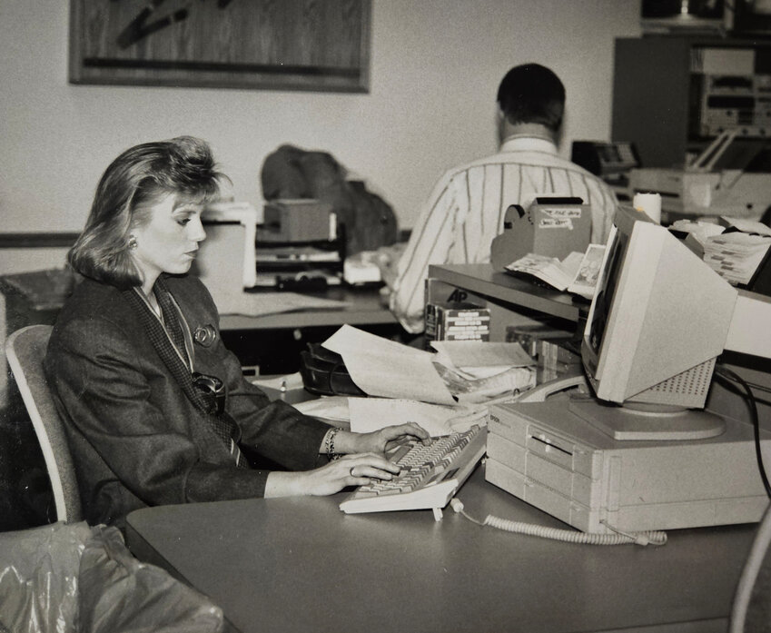 Courtesy Sheri Jones Jones works on the 11 p.m. newscast in the WLNS-TV newsroom circa 1992.