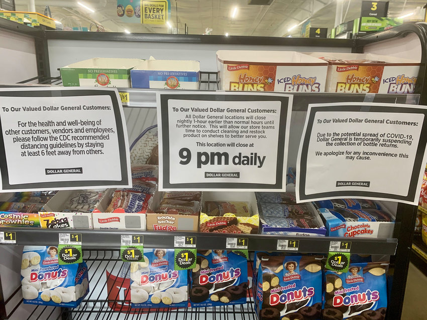 Signs posted by Dollar General.
