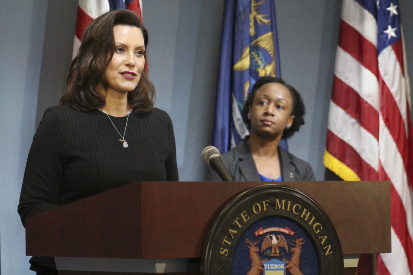 Gov. Gretchen Whitmer speaks at a press conference earlier this afternoon in Lansing.