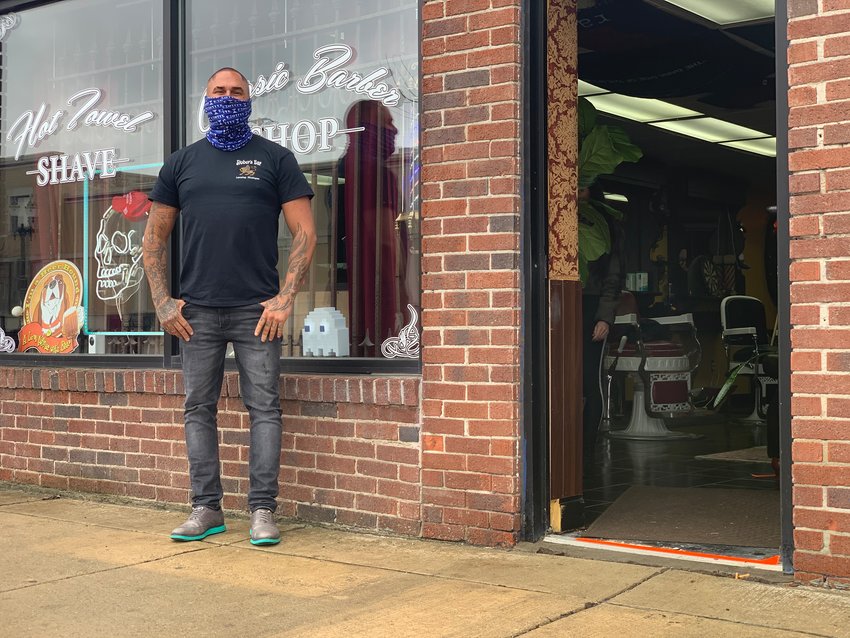 Brian Caskey, owner of Classic Barber Shop, 810 E. Michigan Ave., reopened today because &ldquo;if I don&rsquo;t come to work, I&rsquo;m going to lose my business.&rdquo;&nbsp;