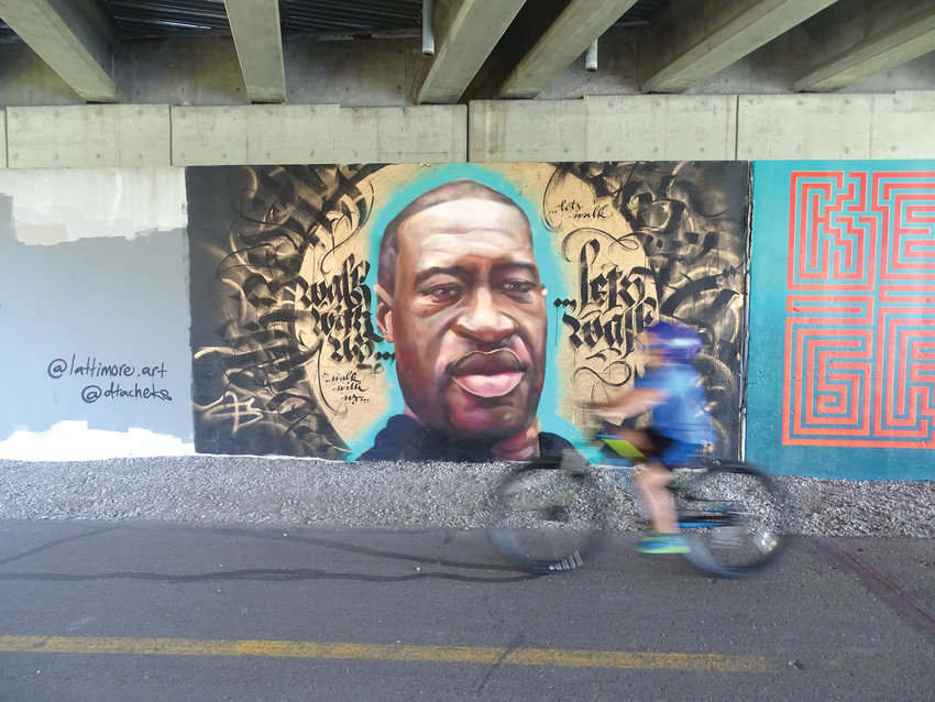 Last week, Flint artist Isiah Lattimore painted a portrait of George Floyd under I-496 next to the Lansing River Trail.